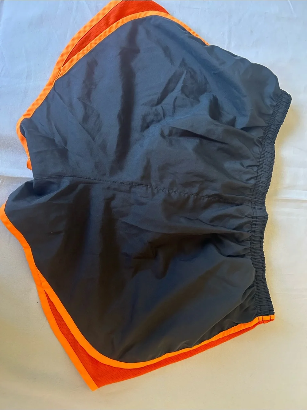Nike Women’s Black and Orange Athletic Shorts